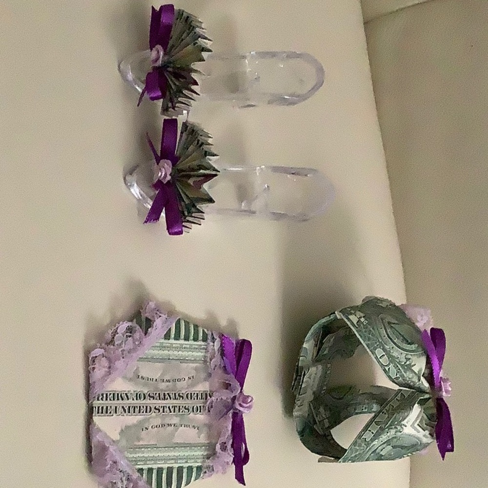 Bra, panties, and pumps, made with money by hand.